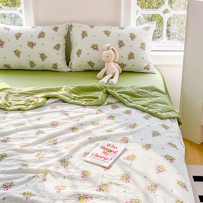 91家纺网 家纺一手货源 找家纺 默忆 2026新款A类泡泡棉夏被泡芙棉印花夏被四件套空调被夏凉被 手捧花绿