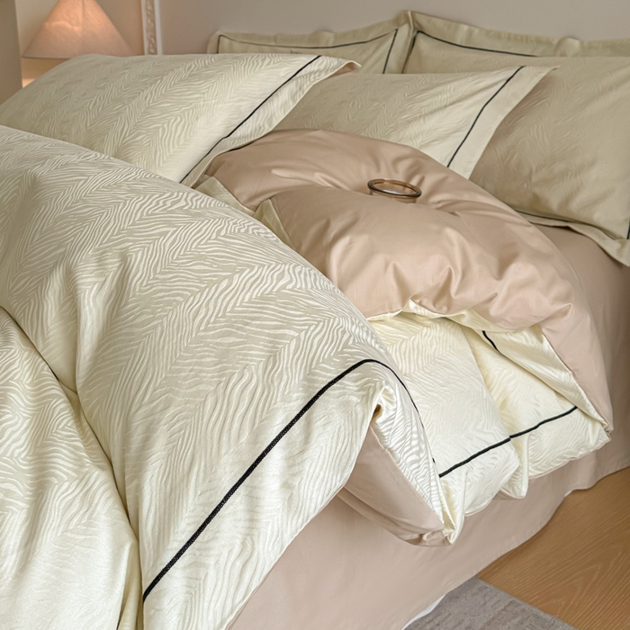 91家纺网 家纺一手货源 找家纺 首尔家纺 2026新款浮雕提花色织全棉四件套 斑马纹-米白拼咖