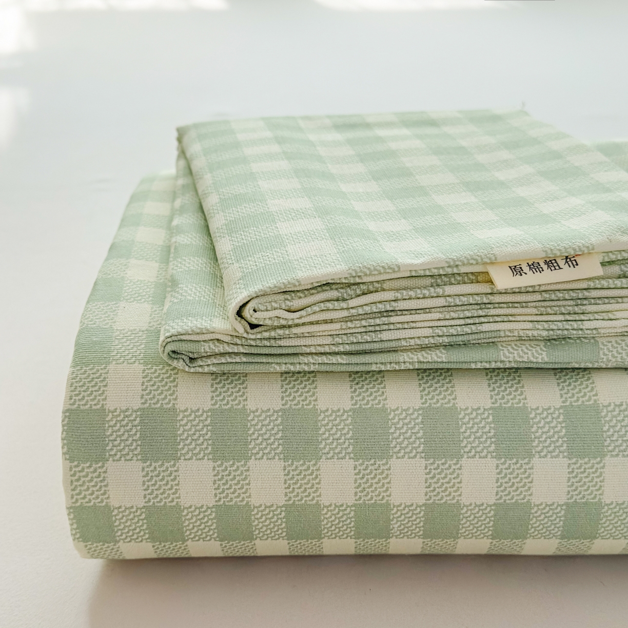 91家纺网 家纺一手货源 找家纺 爱彼家纺 2026新款无印格子分老粗布床单软凉席床单枕套三件套新升级细沙-格子系列一 格子绿