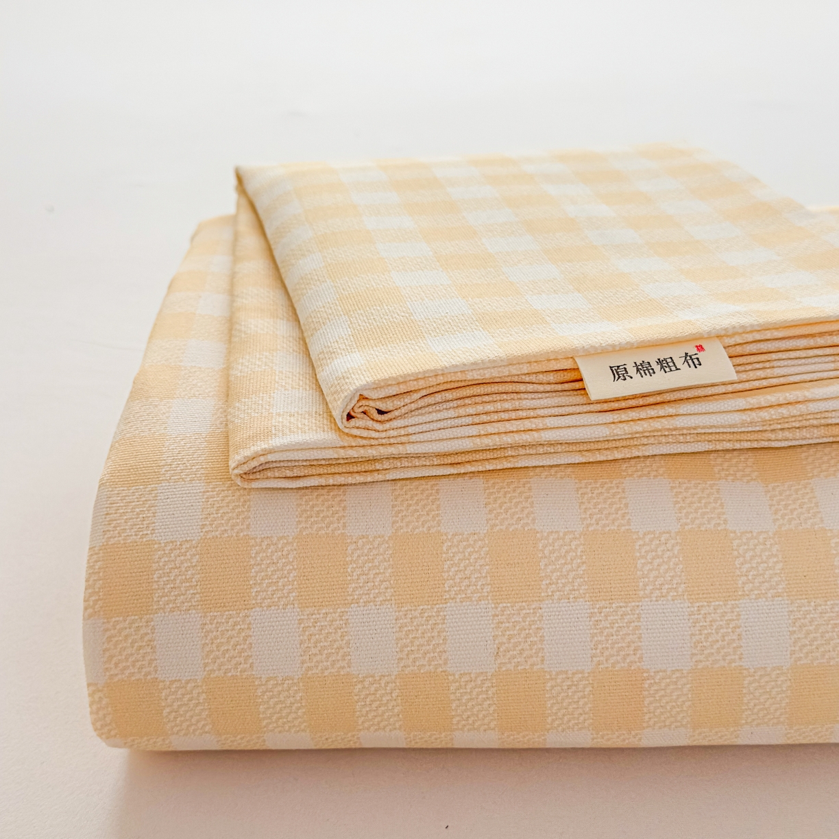 91家纺网 家纺一手货源 找家纺 爱彼家纺 2026新款无印格子分老粗布床单软凉席床单枕套三件套新升级细沙-格子系列一 格子黄