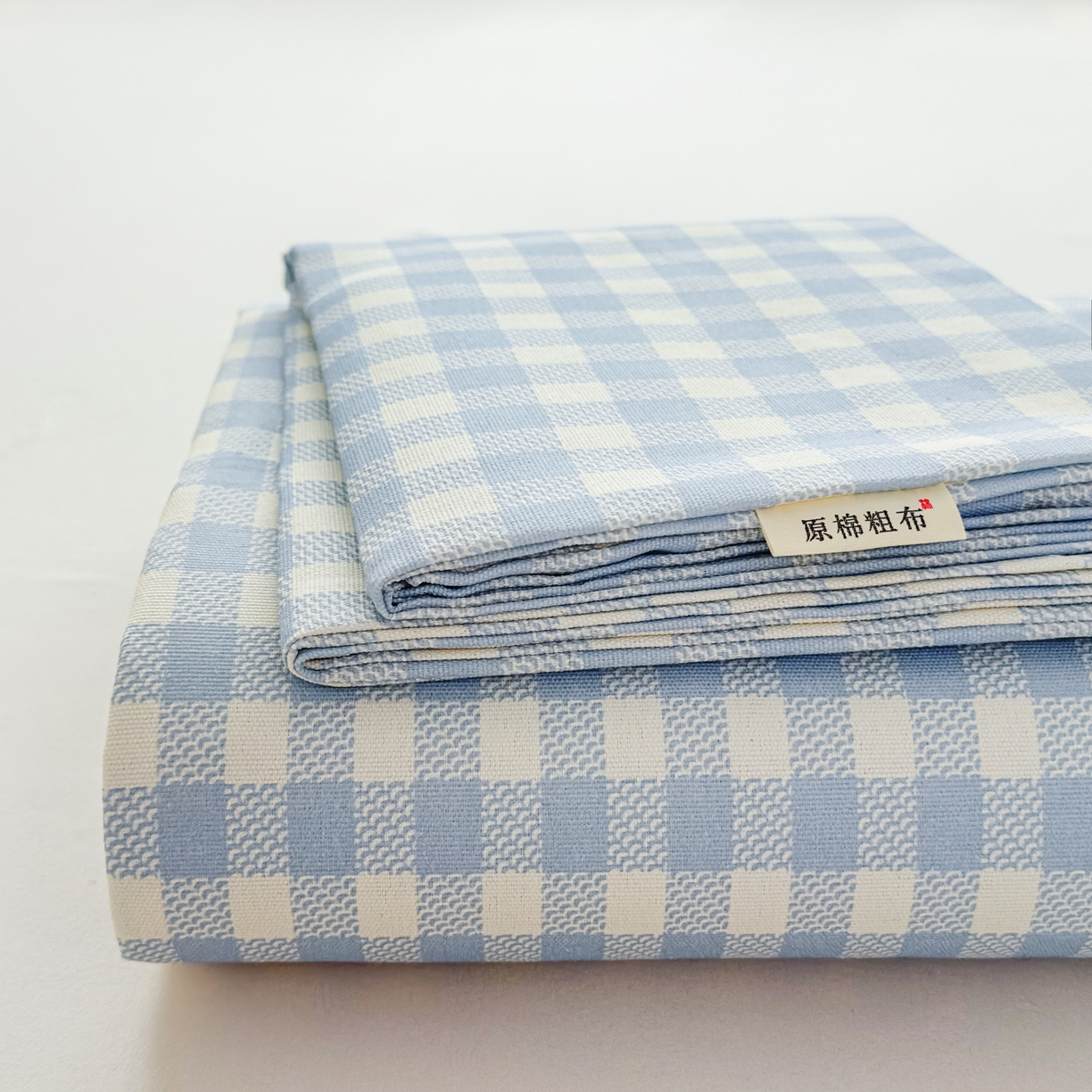 91家纺网 家纺一手货源 找家纺 爱彼家纺 2026新款无印格子分老粗布床单软凉席床单枕套三件套新升级细沙-格子系列一 格子蓝