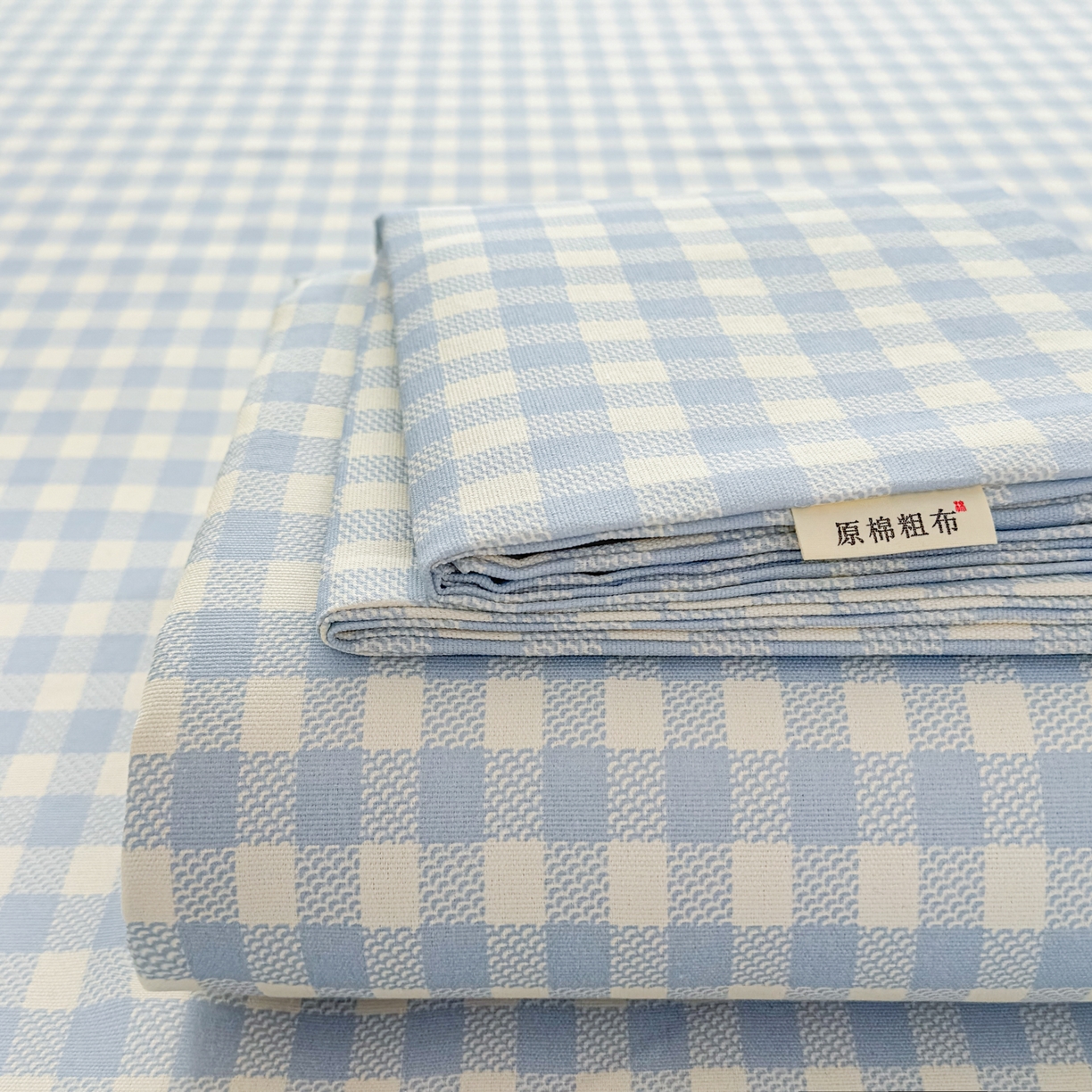 91家纺网 家纺一手货源 找家纺 爱彼家纺 2026新款无印格子分老粗布床单软凉席床单枕套三件套新升级细沙-格子系列一 格子蓝