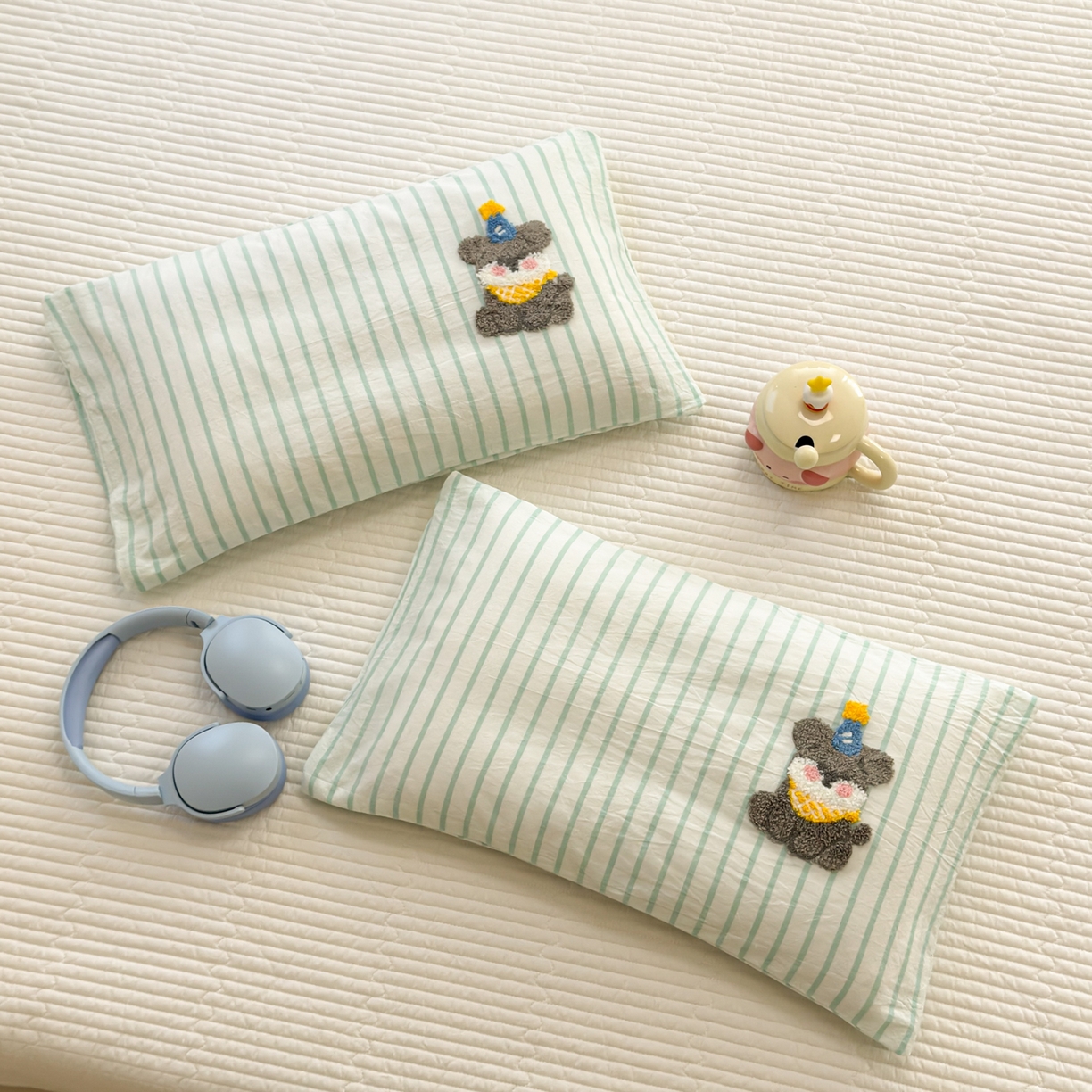 91家纺网 家纺一手货源 找家纺 慕尚 2026新款色织水洗棉毛巾绣枕套 多米 绿条纹