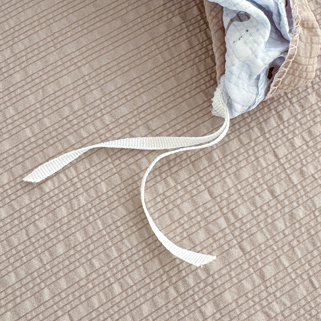 91家纺网 家纺一手货源 找家纺 竹合家纺 2026春夏新品高克重A类泡芙纱泡泡皱皱纱四件套 布丁小兔