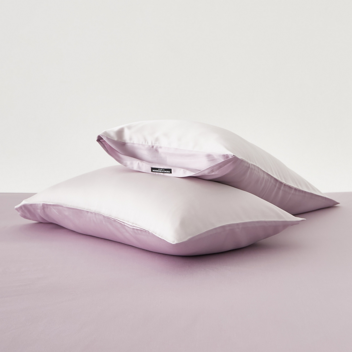 91家纺网 家纺一手货源 找家纺 EH家居 2026春夏新款简约纯色天丝单品枕套（AB版）（被套同款） 仲夏-浅樱粉紫