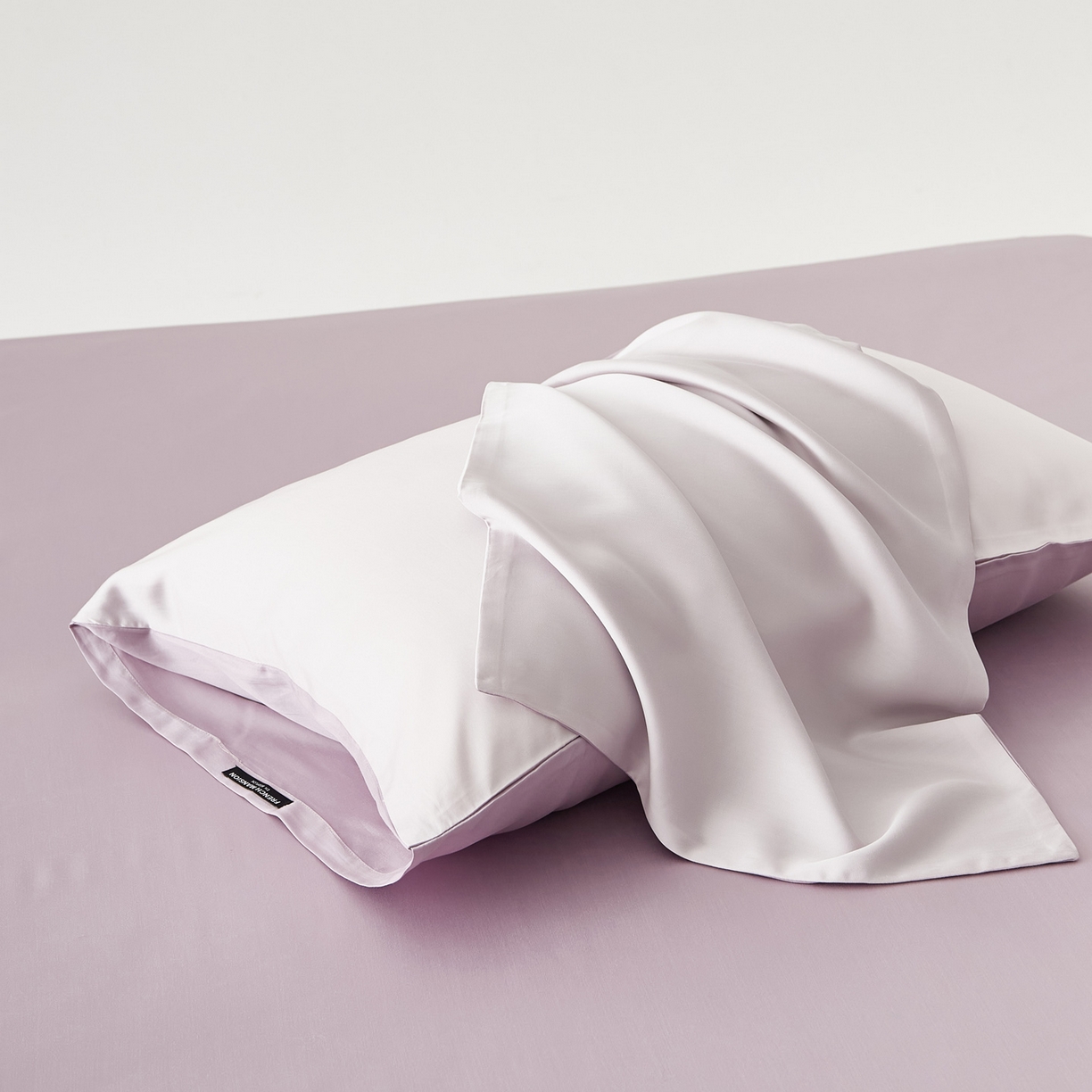 91家纺网 家纺一手货源 找家纺 EH家居 2026春夏新款简约纯色天丝单品枕套（AB版）（被套同款） 仲夏-浅樱粉紫