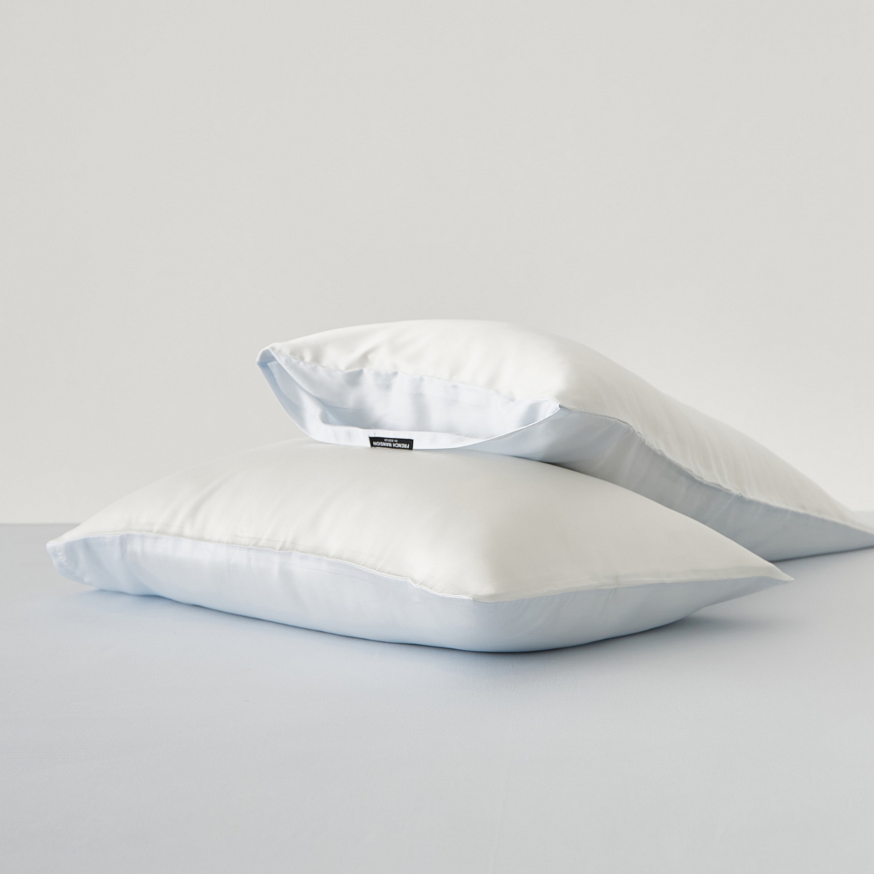 91家纺网 家纺一手货源 找家纺 EH家居 2026春夏新款简约纯色天丝单品枕套（AB版）（被套同款） 仲夏-浅云白