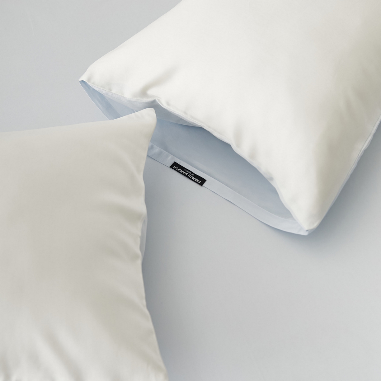 91家纺网 家纺一手货源 找家纺 EH家居 2026春夏新款简约纯色天丝单品枕套（AB版）（被套同款） 仲夏-浅云白