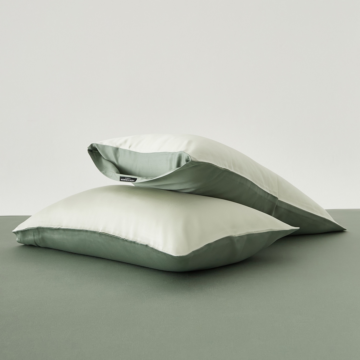 91家纺网 家纺一手货源 找家纺 EH家居 2026春夏新款简约纯色天丝单品枕套（AB版）（被套同款） 仲夏-仲夏夜绿