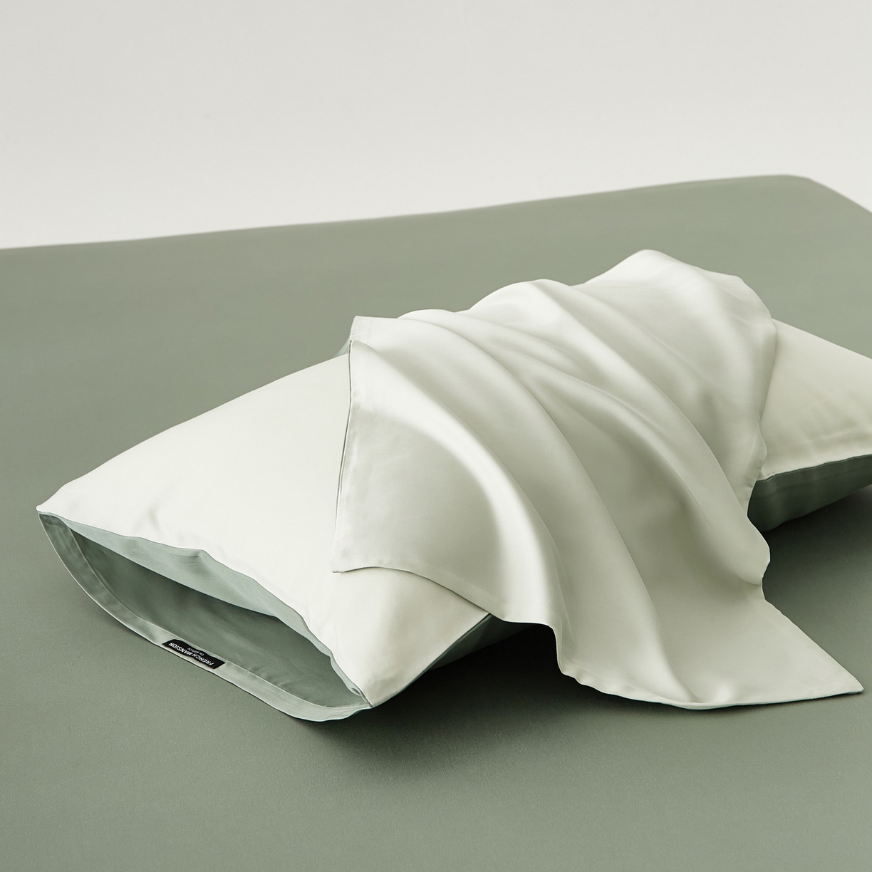 91家纺网 家纺一手货源 找家纺 EH家居 2026春夏新款简约纯色天丝单品枕套（AB版）（被套同款） 仲夏-仲夏夜绿