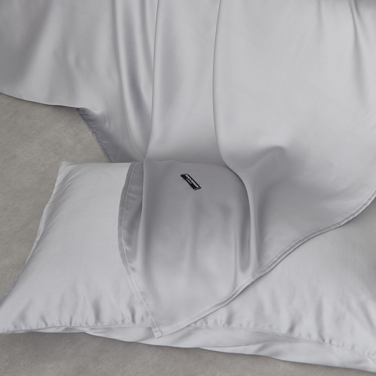 91家纺网 家纺一手货源 找家纺 EH家居 2026春夏新款简约纯色天丝单品床单 丁香灰