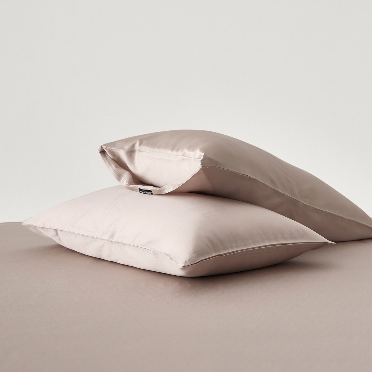 91家纺网 家纺一手货源 找家纺 EH家居 2026春夏新款简约纯色天丝单品枕套（AA版）（床单床笠同款） 罗浮粉