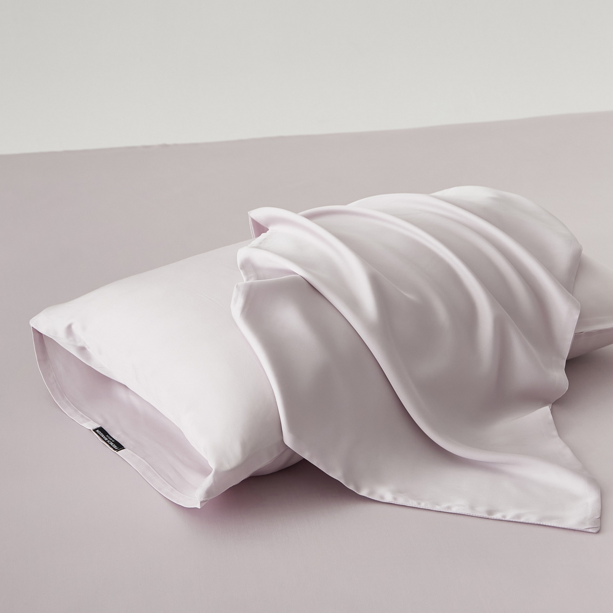 91家纺网 家纺一手货源 找家纺 EH家居 2026春夏新款简约纯色天丝单品枕套（AA版）（床单床笠同款） 月见粉