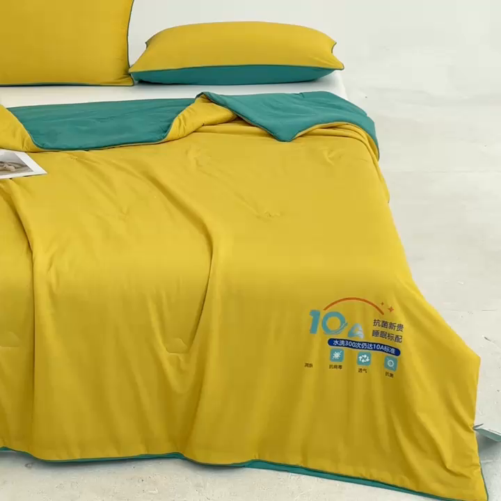 91家纺网 家纺一手货源 找家纺 宝士康家纺 2026春夏新款10A抗菌凉感丝夏被夏凉被空调被 橙黄绿野