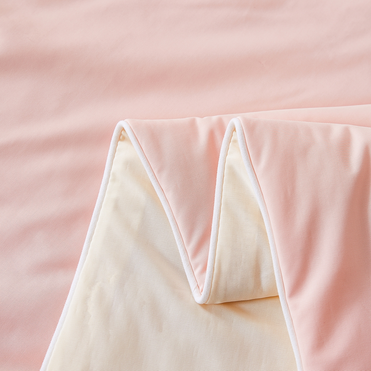 91家纺网 家纺一手货源 找家纺 犇牛仓储供应链 2026新款锦氨凉感夏被被子被芯 橘粉