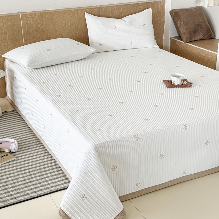 91家纺网 家纺一手货源 找家纺 木楌家居 2026春夏新款双面全棉纯棉皱皱纱刺绣款床盖床盖单件 奶咖蝴蝶结