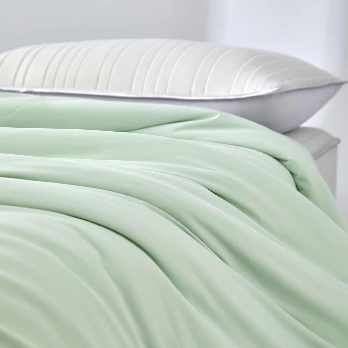 91家纺网 家纺一手货源 找家纺 吾秀家居 吾诺 2026 真凉感 真锦氨 锦氨凉感夏被四件套 锦纶凉感丝夏凉被 - 冰皮系列 冰皮清凉绿