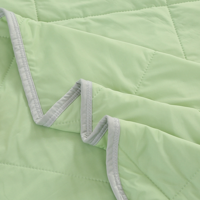 91家纺网 家纺一手货源 找家纺 薇玛仕 2026新款超声波带氨凉感丝纯色瓜瓜凉感夏被空调被 纯色果绿