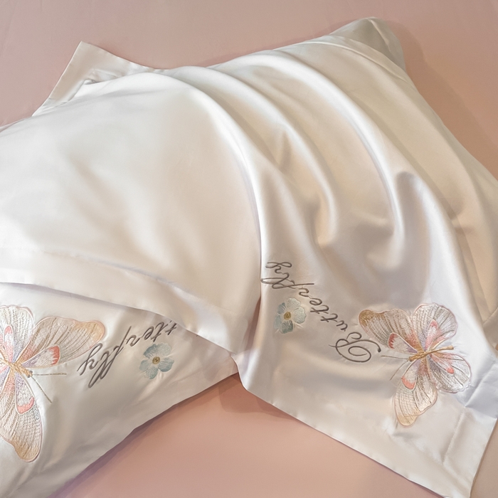 91家纺网 家纺一手货源 找家纺 绘萱家居 2026直播爆款纯棉100%全棉纯棉绣花四件套圆角吊边床单款纯色百分百 七彩福蝶-奶白粉