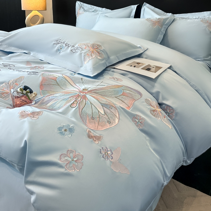 91家纺网 家纺一手货源 找家纺 绘萱家居 2026直播爆款纯棉100%全棉纯棉绣花四件套圆角吊边床单款纯色百分百 七彩福蝶-蓝