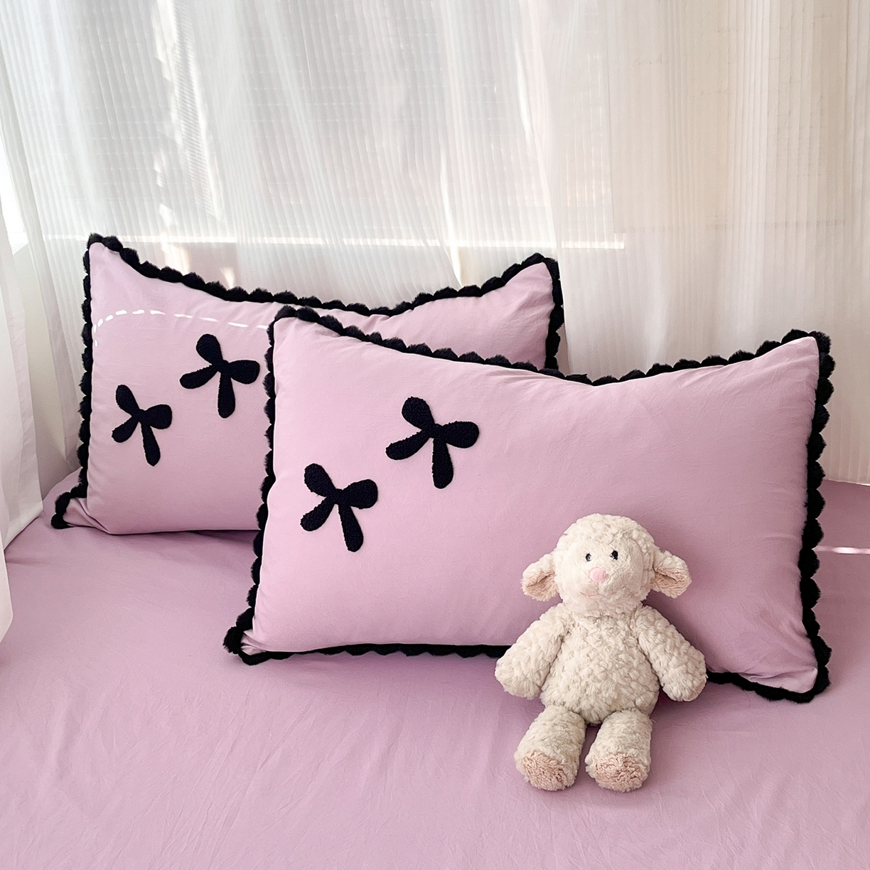 91家纺网 家纺一手货源 找家纺 金阳光家纺 2026新款古法水洗仿棉毛球款四件套 毛球-紫色蝴蝶结