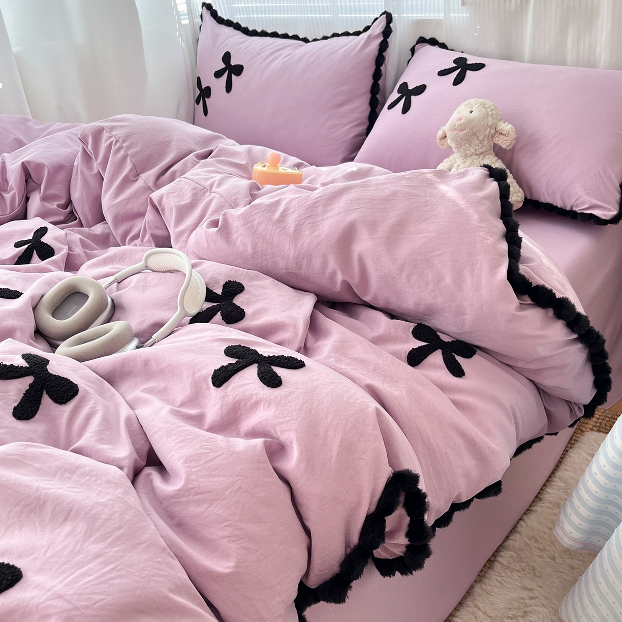91家纺网 家纺一手货源 找家纺 金阳光家纺 2026新款古法水洗仿棉毛球款四件套 毛球-紫色蝴蝶结