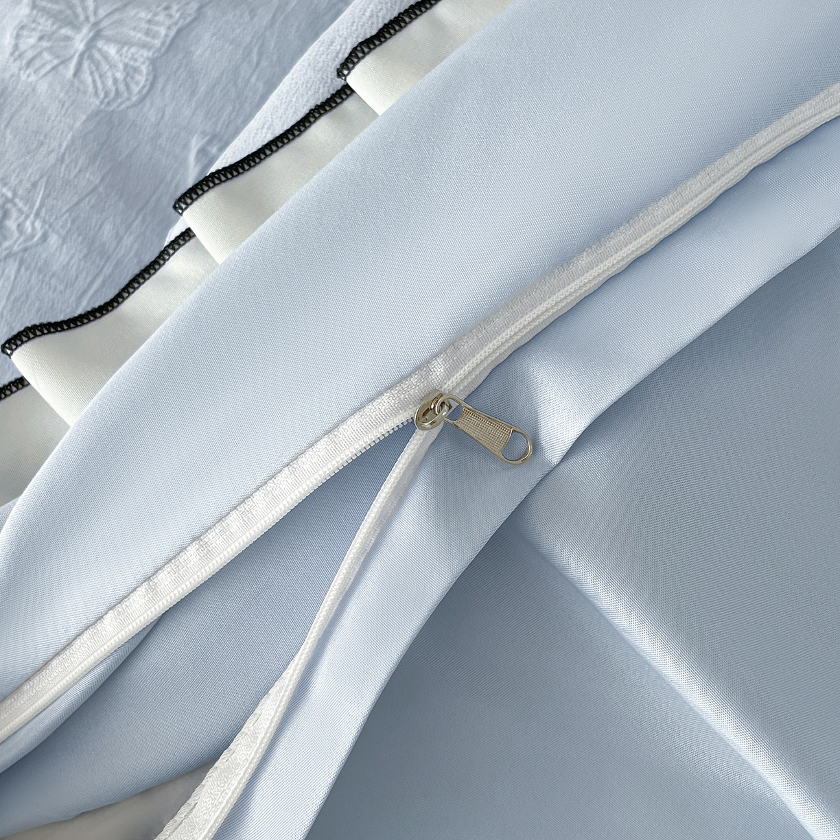 91家纺网 家纺一手货源 找家纺 金阳光家纺 2026新款立体浮雕双层花边水洗真丝四件套 蝴蝶-蓝