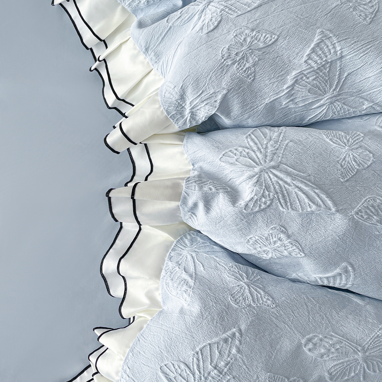 91家纺网 家纺一手货源 找家纺 金阳光家纺 2026新款立体浮雕双层花边水洗真丝四件套 蝴蝶-蓝