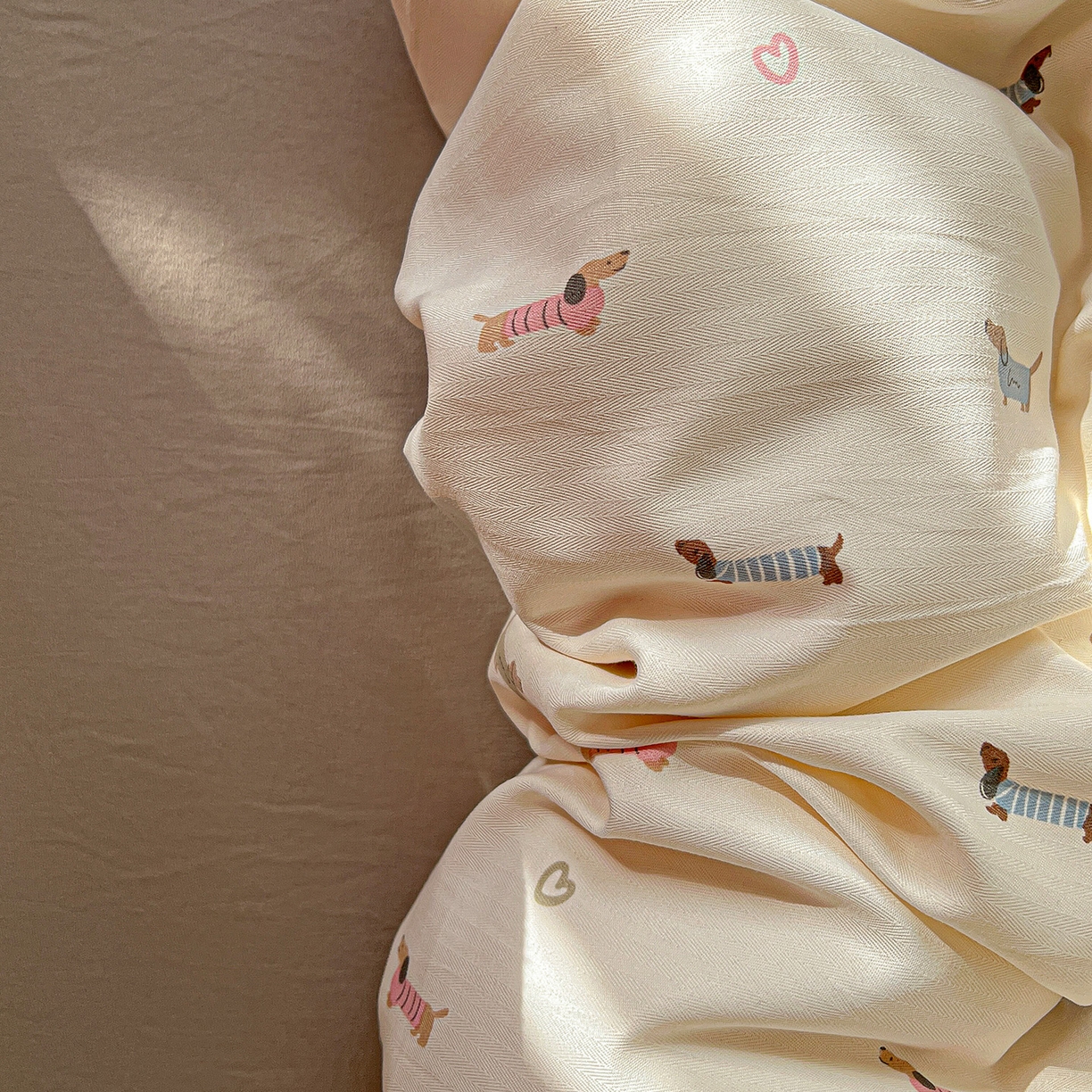 金梦拉家纺 2026春夏新款高克重提花色织印花小布袋四件套 椰椰奶狗