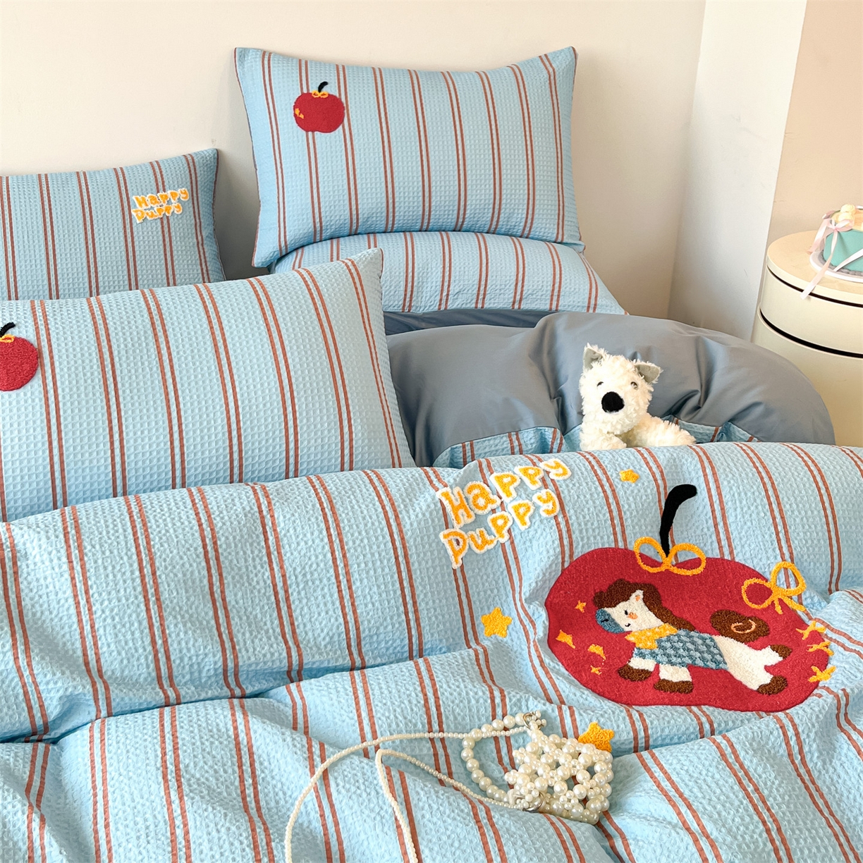 91家纺网 家纺一手货源 找家纺 眷恋家纺 2026新款全棉纯棉A版华夫格B版40支毛巾绣四件套 条纹木马