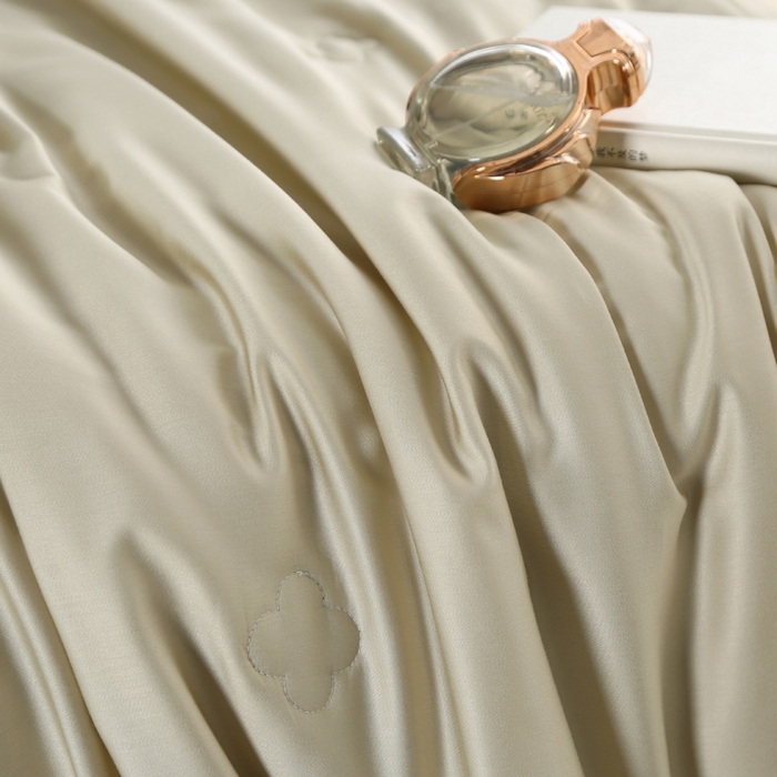 91家纺网 家纺一手货源 找家纺 薇玛仕 2026春夏新款镂空款60天丝莱赛尔蚕丝纯色夏凉被空调被 米绿