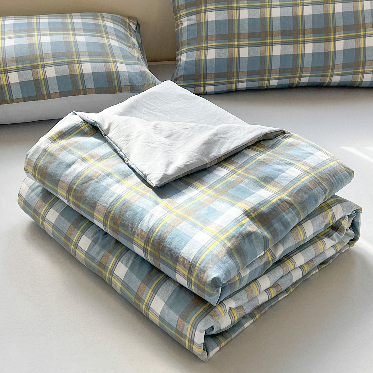 91家纺网 家纺一手货源 找家纺 纽缦家纺 2026新款水洗棉简约格子风夏被 简意