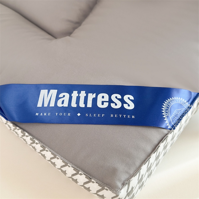 91家纺网 家纺一手货源 找家纺 优雅星家纺 2026新款A类水洗棉抗菌大豆床垫千鸟格系列 灰色