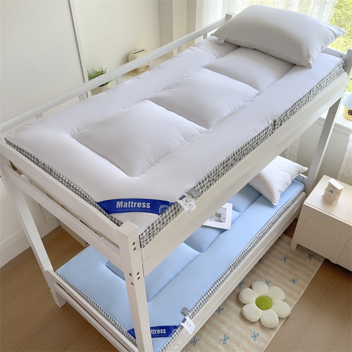 91家纺网 家纺一手货源 找家纺 优雅星家纺 2026新款A类水洗棉抗菌大豆床垫千鸟格系列 蓝色