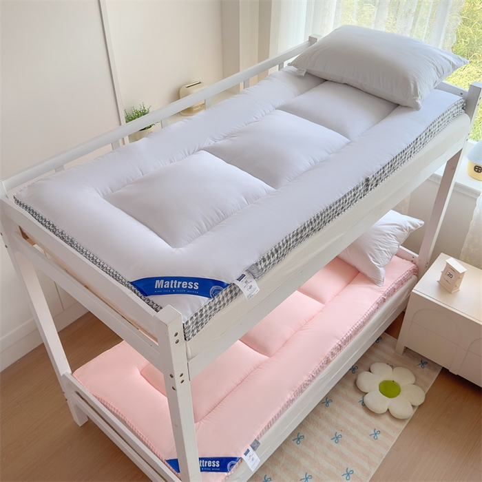 91家纺网 家纺一手货源 找家纺 优雅星家纺 2026新款A类水洗棉抗菌大豆床垫千鸟格系列 粉色