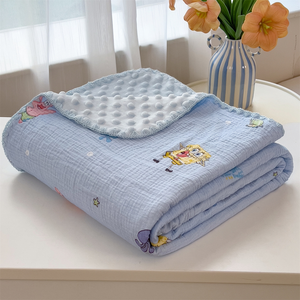 91家纺网 家纺一手货源 找家纺 兄弟坊 2026新款正版授权卡通全棉双层纱安抚被夏被纱布豆豆毯学校午睡被 热情海绵蓝