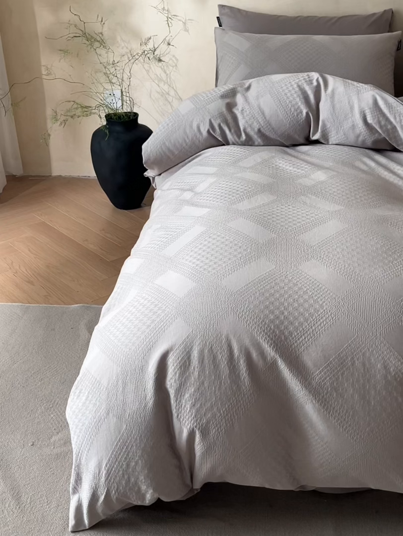 91家纺网 家纺一手货源 找家纺 2026春夏新款全棉提花浮雕四件套 千喜格