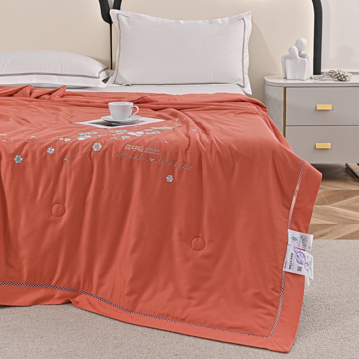 91家纺网 家纺一手货源 找家纺 太阳羽家纺 2026新款天丝绣花镂空夏被夏凉被空调被--深呼吸 深呼吸-橘色