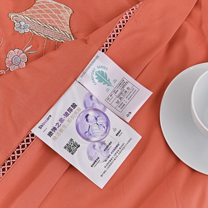 91家纺网 家纺一手货源 找家纺 太阳羽家纺 2026新款天丝绣花镂空夏被夏凉被空调被--深呼吸 深呼吸-橘色