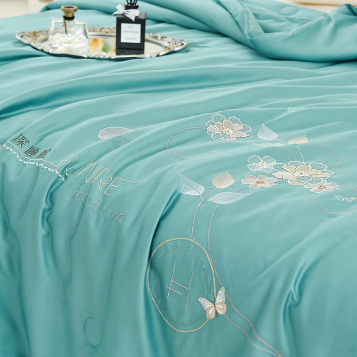 91家纺网 家纺一手货源 找家纺 太阳羽家纺 2026新款天丝绣花镂空夏凉被空调被深睡眠夏被 海蓝色