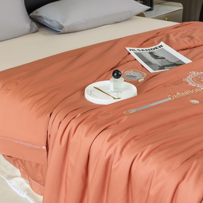 91家纺网 家纺一手货源 找家纺 太阳羽家纺 2026新款60支天丝提花镂空夏被夏凉被空调被冰豆系列 冰豆-橙