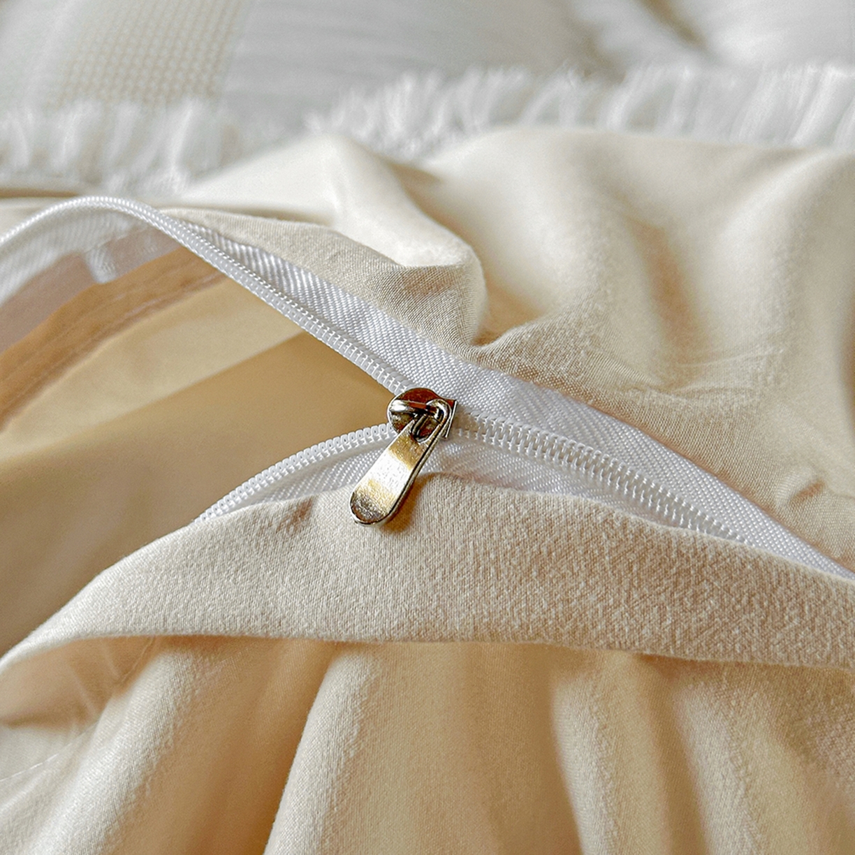 91家纺网 家纺一手货源 找家纺 缘生活 2026新款色织提花双层纱华夫格流苏四件套 双工艺流苏-米白色