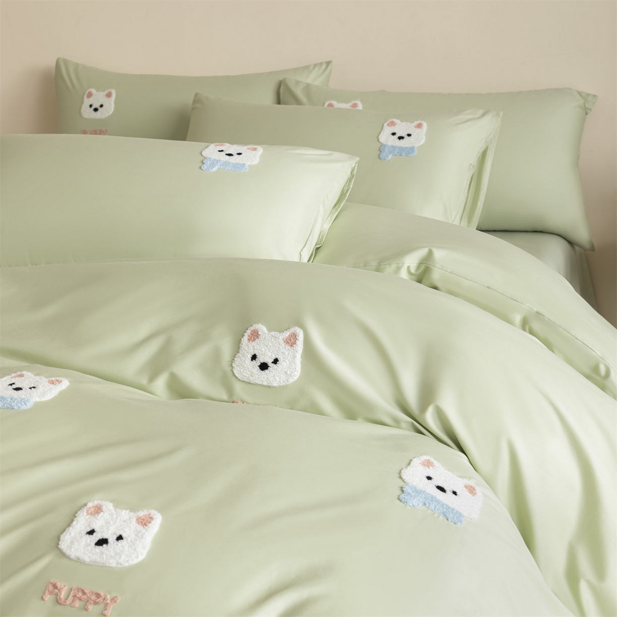 91家纺网 家纺一手货源 找家纺 857家居 2026新款全棉毛巾绣四件套 奶绿狗