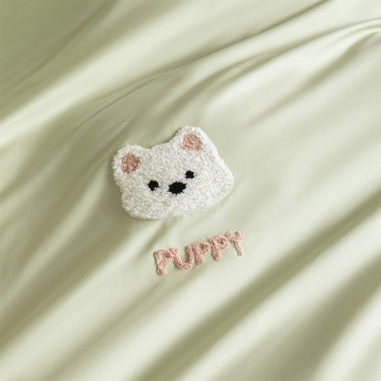 91家纺网 家纺一手货源 找家纺 857家居 2026新款全棉毛巾绣四件套 奶绿狗