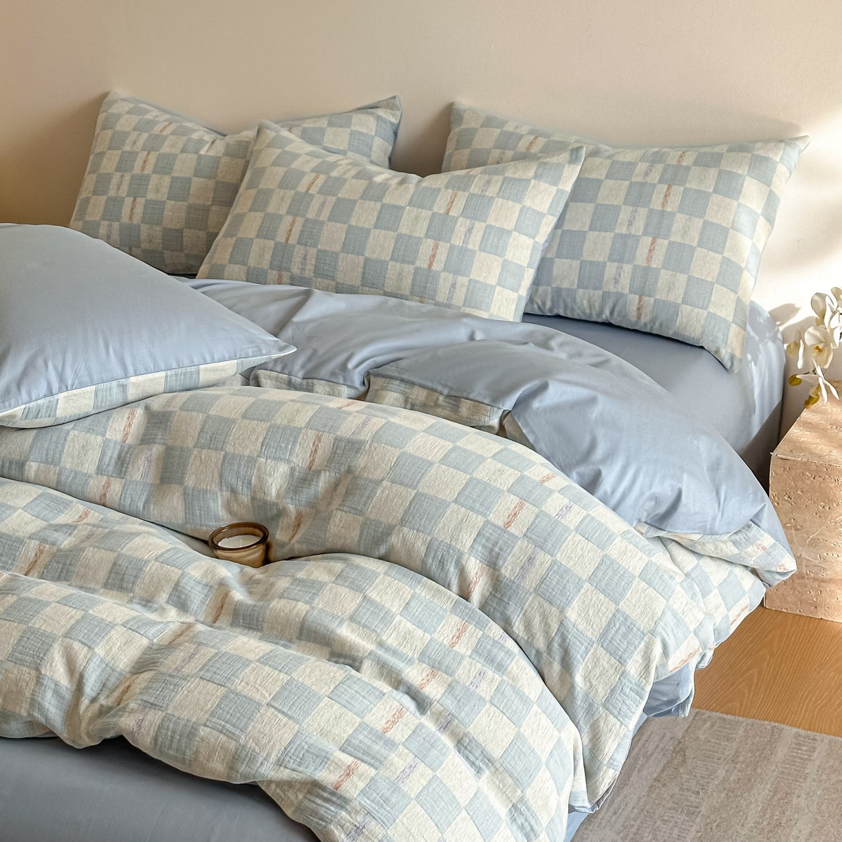 91家纺网 家纺一手货源 找家纺 眠博士 2026新款色织水洗双层纱提花四件套 曲奇蓝格