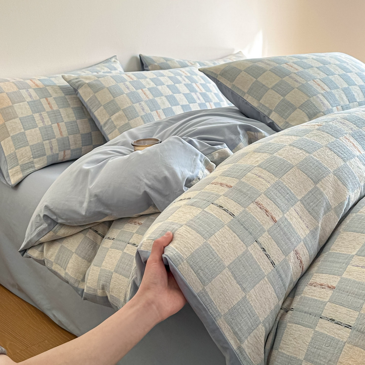 91家纺网 家纺一手货源 找家纺 眠博士 2026新款色织水洗双层纱提花四件套 曲奇蓝格