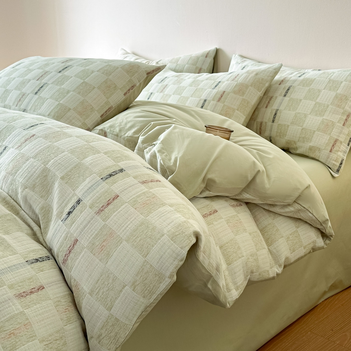 91家纺网 家纺一手货源 找家纺 眠博士 2026新款色织水洗双层纱提花四件套 曲奇绿格