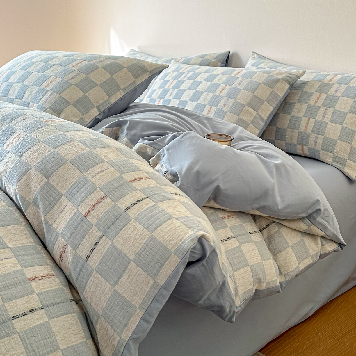 91家纺网 家纺一手货源 找家纺 眠博士 2026新款色织水洗双层纱提花四件套 曲奇蓝格