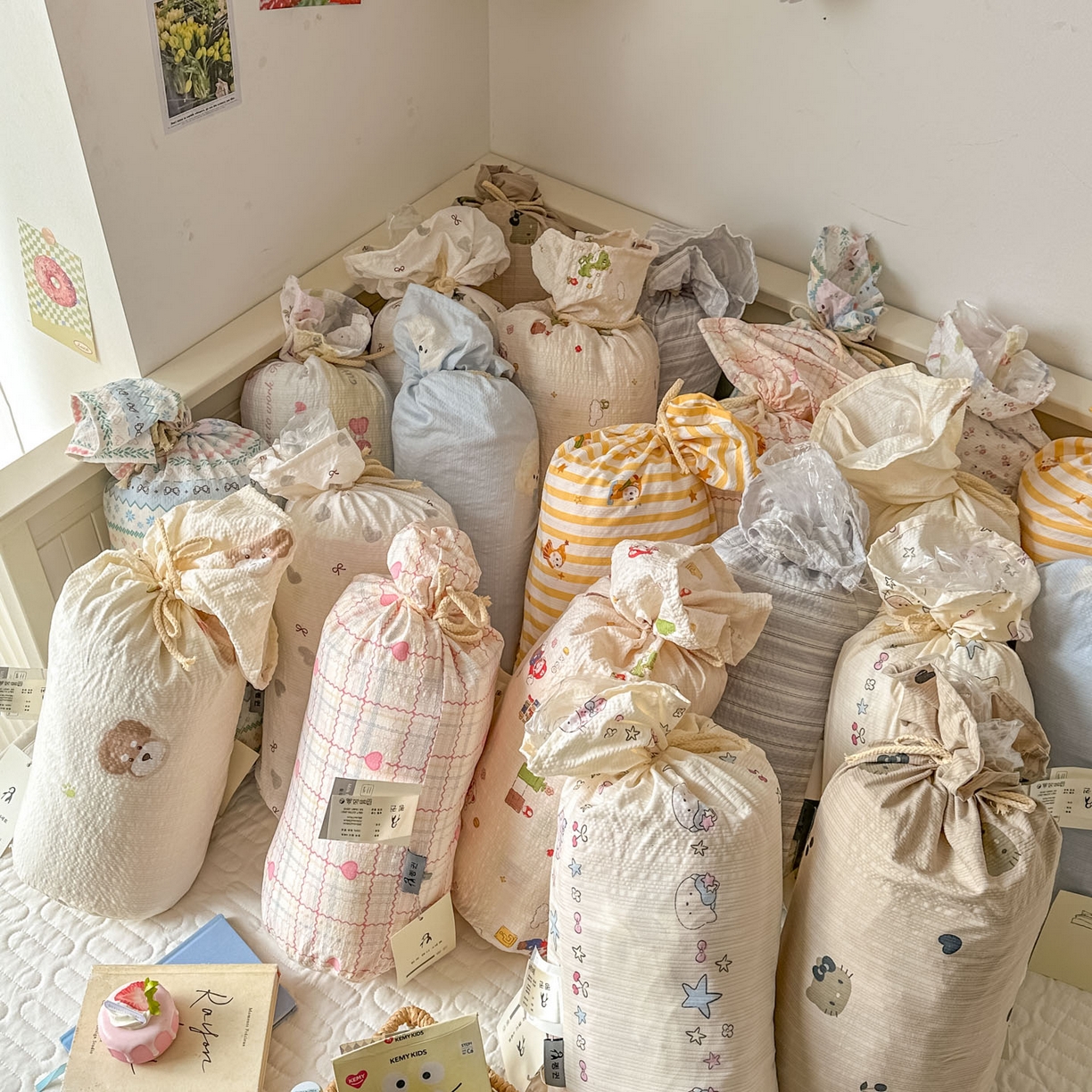 91家纺网 家纺一手货源 找家纺 暖伊家居 2026新款糖果小布袋泡芙纱四件套 组合图仅供展示