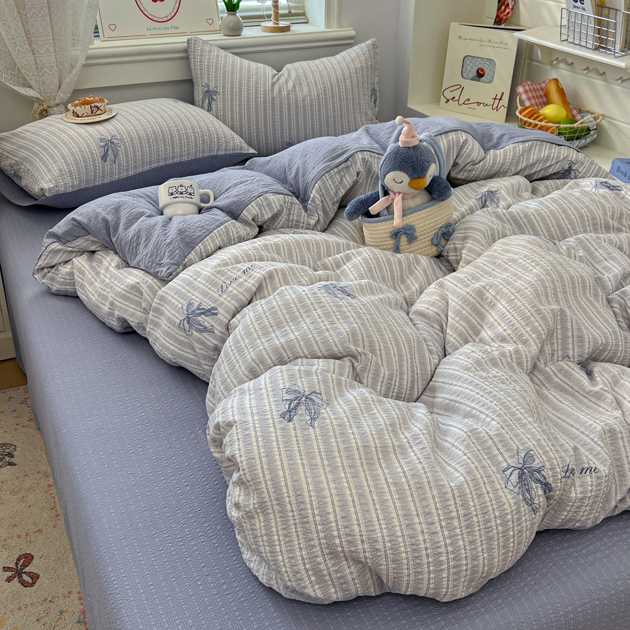 91家纺网 家纺一手货源 找家纺 暖伊家居 2026新款糖果小布袋泡芙纱四件套 海盐蝴蝶结